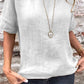 Blusa feminina de algodão e linho, de cor lisa, com gola redonda e mangas curtas