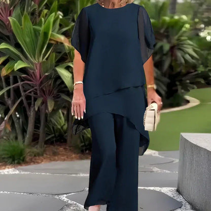 💎 60% DE DESCONTO! 💎 Conjunto encantador composto por top assimétrico e calças largas – bainha assimétrica, dupla camada esvoaçante e elegância para todo o dia 👗✨