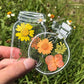 Marcadores de livros transparentes com flores secas DIY