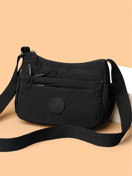 💐50% DE DESCONTO! Bolsa Transversal Feminina Lisa – Vários Bolsos e Fecho com Zíper 🔐👛【Estoque Limitado】