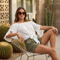 🎁Novidades com 50% de desconto💥Blusa casual de verão para mulher com ombros à mostra e laço frontal
